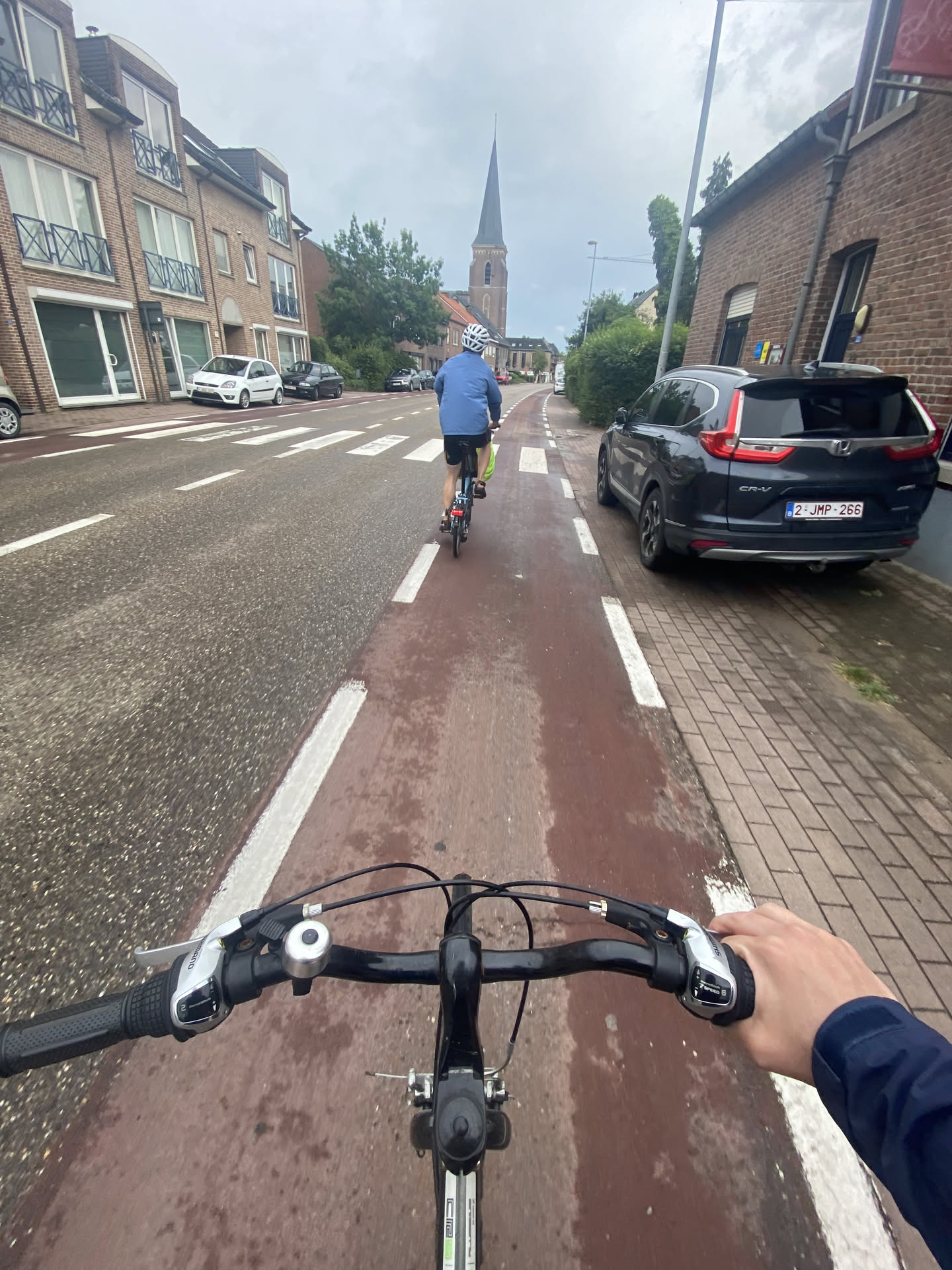 biking
through a Belgian village